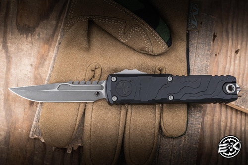 Microtech UTX-85 Gen IV OTF Automatic Knife Topographic Engraved Black Aluminum 3.1" M390 Clip Point Apocalyptic 12354TP-10APS
