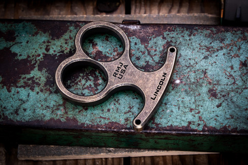 RMJ Lincoln Two Finger Knucks Brass Vintage Patina