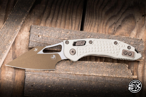 Microtech M-Stitch Ram-LOK Folding Knife Frag Aluminum 3" M390 Wharncliffe Champagne Gold 169MRL-1FRCG-C19Z23
