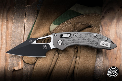 Microtech M-Stitch Ram-LOK Folding Knife Natural Clear Frag Aluminum 3" M390 Wharncliffe Black 169MRL-1FRNC