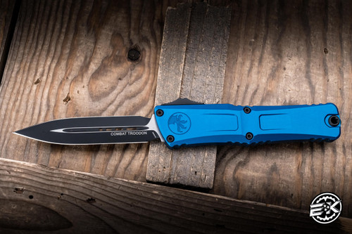 Preowned-Microtech Combat Troodon Gen III OTF Automatic Knife Blue Aluminum 4" M390 Dagger Black 1142-1BL