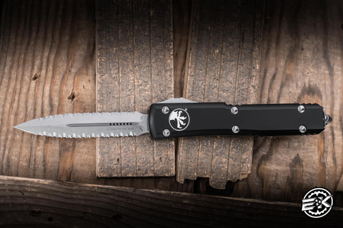 Preowned-Microtech Ultratech OTF Automatic Knife Black Aluminum 3.4" M390 Dagger Serrated 122-D12