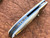 Sean Ohare "Eclipse" Mother of Pearl Mokume Bolsters Carbon Damascus Blade