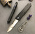 Marfione Combat Troodon OTF Purple Haze Accents Recurve Mirror Polish M390