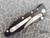 MICROTECH SOCOM DELTA ALUMINUM FOLDER 4" BLACK SERRATED 159-2