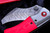 Jonathan McNees Hawkbill Red Carboquartz, Zirconium Bolsters/Clip 3.5" Damascus