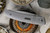 J. Oeser Knives F22 Kickstop Flipper Titanium Satin Hardware 3.3" M390