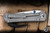 Left Hand-Chris Reeve Knives Large Inkosi Folding Knife Sandblasted Titanium, Blue Accents 3.6" MagnaCut Drop Point LIN-1001