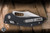 Microtech/Borka Blades Stitch Ram-LOK Manual Folder Knife Black Fluted G10 3.75" M390 Stonewash Serrated 169RL-11FLGTBK	