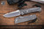 Left Hand-Chris Reeve Knives Umnumzaan Folding Knife Sandblasted Titanium 3.6" MagnaCut Drop Point Stonewash UMN-1001