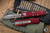 Microtech UTX-85 OTF Automatic Merlot Red 3" M390 Drop Point Apocalyptic Serrated Stonewash 231-11APMR