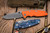 Hinderer Knives Eklipse 3.5" Slicer Hollow Ground -Orange G10, Battle Blue Titanium