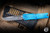 Preowned-Microtech Combat Troodon Gen III OTF Automatic Knife Marbled Blue 4" M390 Stonewash 1143-10MBL