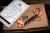 Preowned-Blackside Customs T-Bot Tactical Tool & Bottle Opener Copper/Carbon Fiber Inlay