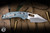 Microtech Marfione Select Stitch Ram-Lok Manual Titanium Blue Accents 3.75" M390 Stonewash Serrated 169RL-11MS6