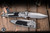 Microtech Marfione Select Socom RAM-LOK Manual Knife Stonewash Titanium, Bronze Accents Double Vapor Blast 4" M390 Stonewash Spear Point Part Serrated 160RL-11SMS2