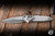 Microtech Marfione Select Socom RAM-LOK Manual Knife Slab Stonewash Titanium, Blue Accents Double Vapor Blast 4" M390 Stonewash Spear Point Part Serrated 160RLS-11SMS3