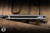 Preowned-Chris Reeve Knives Umnumzaan Folding Knife Titanium 3.6" MagnaCut Tanto Stonewash
