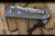 Preowned-Chris Reeve Knives Umnumzaan Folding Knife Titanium 3.6" MagnaCut Tanto Stonewash