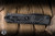 Microtech UTX-85 Gen IV OTF Automatic Knife Topographic Black Aluminum 3.1" M390 Tanto Full Serrated 12334-3TP