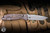 Rick Hinderer Knives FireTac Folding Knife Orange/Black G10/Bronze Titanium 3.6" 20CV Tanto Bead Blasted