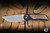 ProTech Mordax Manual Flipper Knife Black Aluminum/Casted White Brass "USA 250th", White Pearl Button 3.75" MagnaCut Stonewash - Blade Show Exclusive