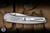 ProTech x Peace Neighbor Custom 004 Avalon Manual Folding Knife Knurled Grey Aluminum, White Pearl Button 4.25" 154CM Mike Irie Mirror Polish - Blade Show Exclusive