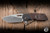 A2D Attn2Detail Mercantile Mark 1 Large Folding Knife Antique Chocolate Micarta/Integral Skull & Crossbones 4" MagnaCut Drop Point Rising Grind - Blade Show Exclusive