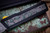 Chaves Knives Dissident OTF Automatic Knife Black Blasted Aluminum, Scrooge McDuck CF Inlay 3.8" M390 Tanto Stonewash