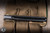 Remette RT-Infinite Power Folding Knife Black Titanium, Gold Accents 3.15" M390 Dagger Pearlescent