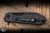 Heretic Knives Jinn Button Lock Manual Flipper Knife DLC Glow Carbon Fiber 3" MagnaCut Wharncliffe DLC H213-6A-GLOCF