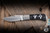 Preowned-Kizer Knives Trestle Halloween Limited Edition Folding Knife Titanium/Ghosts Carbon Fiber Inlay 2.89" 14C28N Clip Point Satin