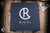 Preowned-Chris Reeve Knives Large Sebenza 31 Folding Knife Champagne Titanium/Black Diamond Richlite Inlay 3.6" MagnaCut Drop Point Stonewash 