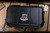 Preowned-Bastinelli Knives Mako Folder Knife 2 Saints Sculpted Bronze Skulls 2.6" N690 Karambit Black Stonewash
