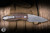 Preowned-Three Rivers Manufacturing Neutron 2 Folding Knife 3D Contoured Sunset Orange Camo Carbon 3" MagnaCut Drop Point Stonewash N2LL-SSORCC-MC