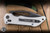  Heretic Knives Koschei Manual Folding Knife Blizzardworn Aluminum 3.5" MagnaCut Drop Point Battleworn Black