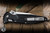 Microtech Socom Elite RAM-LOK Manual Folding Knife Black Frag Aluminum 3.8" M390 Clip Point Stonewash Serrated 160RL-11FR