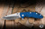 Hinderer Knives XM-18 Flipper Folding Knife Triway Blue/Black G10/Battle Black Titanium 3.5" MagnaCut Spanto Stonewash