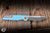Preowned-Tactile Knife Co. "Rockwall" GT Folding Knife Blue Titanium/Orange Accents 2.84" MagnaCut Tanto
