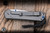 Preowned-Chris Reeve Knives Small Sebenza 31 Folding Knife Glass Blasted Titanium/Blue Accents 3" MagnaCut Polished S31-1016