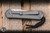 Preowned-Chris Reeve Knives Small Sebenza 31 Folding Knife Glass Blasted Titanium/CGG Forever Flag 3" MagnaCut Drop Point S31-1690