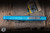 Preowned-Microtech Combat Troodon Gen III OTF Automatic Knife Marbled Blue Aluminum 4" Drop Point Stonewash 1143-10MBL