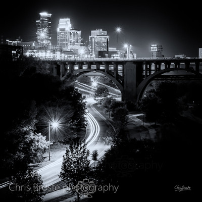 A black and white city skyline photograph of Minneapolis.