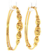 Adjustable 22k gold baby bracelet showcasing  bead detailing