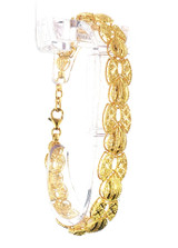 Luxury 22K yellow gold bracelet featuring ornate filigree links, textured finish, and handcrafted openwork design
