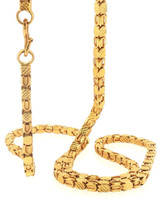 Close-up hanging view of the 22K yellow gold textured link chain necklace, showcasing its alternating geometric diamond-cut links and elongated ribbed open links. The image highlights the intricate surface patterns, dimensional construction, rich yellow-gold finish, and hook-style closure of this substantial 70-gram necklace.