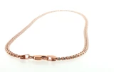 Full-length view of the 22K rose gold necklace arranged against a clean white background, showcasing its continuous textured bead-link pattern and alternating rose and white-tone appearance.