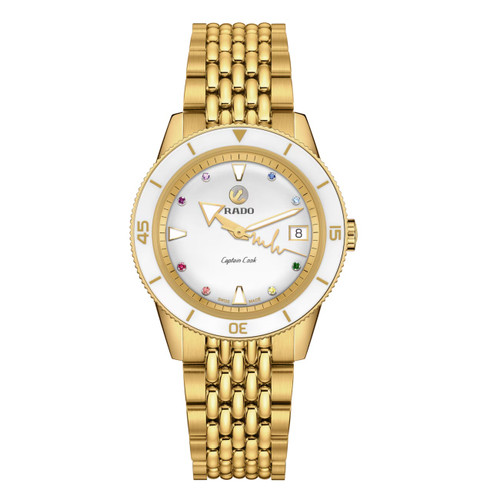 Rado Captain Cook x Marina Hoermanseder Heartbeat R32117708 37mm gold automatic watch. Rado Captain Cook Marina Hoermanseder gold PVD stainless steel bracelet close-up