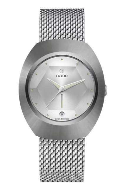 Front view of the Rado DiaStar Original 60-Year Anniversary Edition R12163118 featuring a 38 mm sculpted silver-tone case, geometric silver dial with contrasting brushed finishes, minimalist hour markers and hands, signature Rado anchor emblem, and a finely woven stainless steel mesh bracelet.