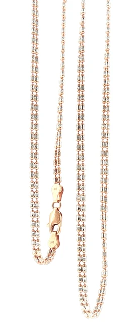 Close-up of a 16-inch 22K rose gold textured chain necklace weighing 10 grams, featuring closely spaced rounded links with contrasting white-tone accents. The image highlights the repeating two-tone pattern, reflective finish, flexible construction, and secure clasp.